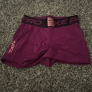 XS purple nike pros
